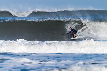 Image showing Surfing the waves