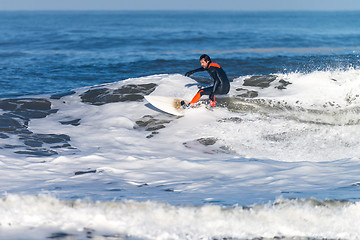 Image showing Surfing the waves