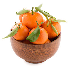 Image showing Tangerines on wooden  bowl 