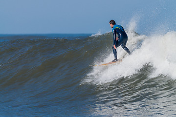 Image showing Surfing the waves