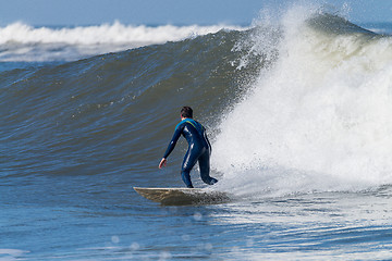 Image showing Surfing the waves