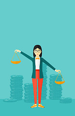 Image showing Business woman with scales.