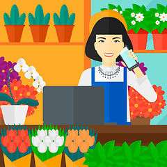 Image showing Florist taking order.