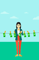 Image showing Woman loundering money.