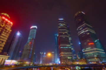 Image showing Shanghai skyline at night out of focus. 