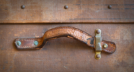 Image showing Old canvas trunk handle close up