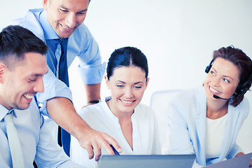 Image showing group of people working in call center