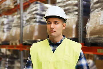 Image showing man in hardhat and safety vest at warehouse