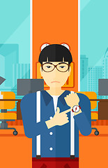 Image showing Angry boss pointing at wrist watch.