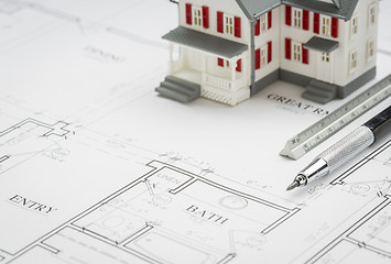 Image showing Model Home, Engineer Pencil and Ruler Resting On House Plans