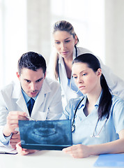 Image showing group of doctors looking at x-ray