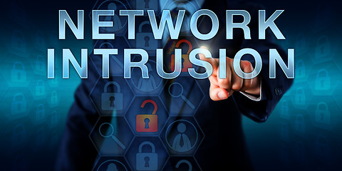 Image showing Cybercriminal Intruder Touching NETWORK INTRUSION