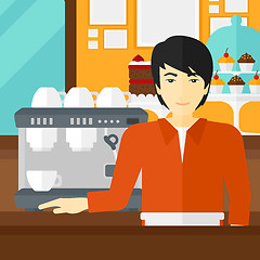 Image showing Barista standing near coffee maker.