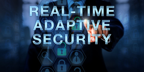 Image showing Manager Touching REAL-TIME ADAPTIVE SECURITY