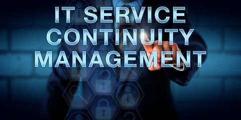 Image showing Manager Touching IT SERVICE CONTINUITY MANAGEMENT