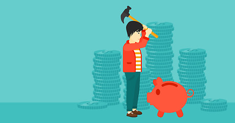 Image showing Man breaking piggy bank.