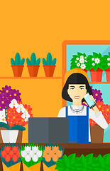 Image showing Florist taking order.