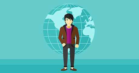 Image showing Businessman standing on globe background.