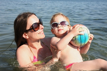 Image showing Mother and daughter in same bikinis