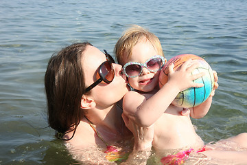 Image showing Mother and daughter playing in the sea