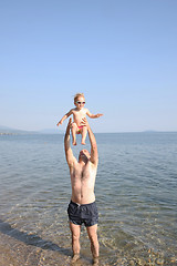 Image showing Father playing with his baby girl