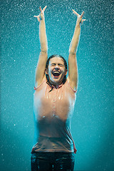 Image showing The portrait of young beautiful woman in the rain