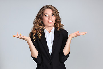 Image showing Portrait of young woman with shocked facial expression