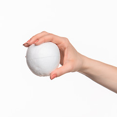 Image showing The female hand holding white blank styrofoam oval 