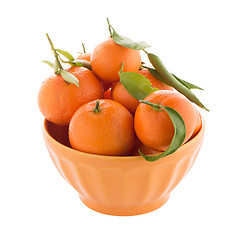 Image showing Tangerines on ceramic orange bowl 