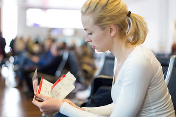 Image showing Woman waiting on airport terminal.