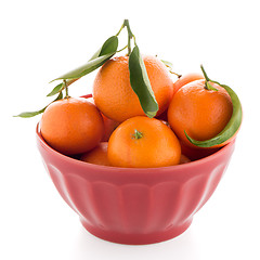 Image showing Tangerines on ceramic red bowl 