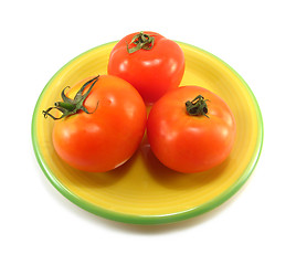 Image showing tomatoes on a yellow plate