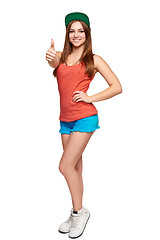 Image showing Full length girl showing thumb up sign
