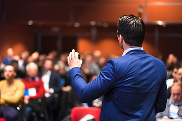 Image showing Public speaker giving talk at Business Event.