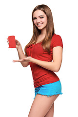 Image showing smiling teen girl holding blank credit card