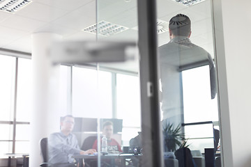 Image showing Business team leader delivering presentation in office.