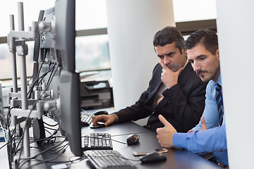 Image showing  Concerned stock traders in trading office.