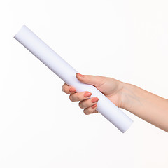 Image showing The cylinder female hands on white background