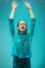 Image showing The portrait of young beautiful woman in the rain