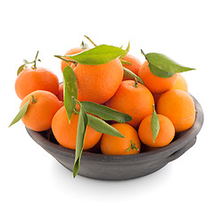 Image showing Tangerines on clay bowl 