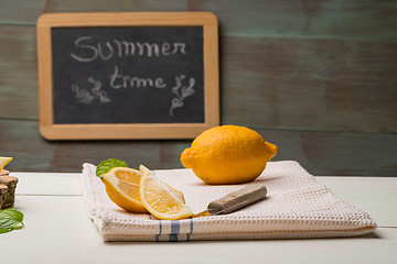 Image showing Lemon and lime slices in jars