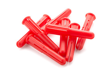 Image showing Red plastic dowels