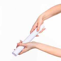 Image showing The cylinder female hands on white background