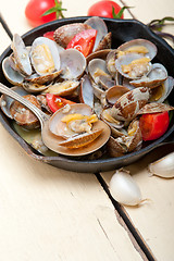 Image showing fresh clams on an iron skillet