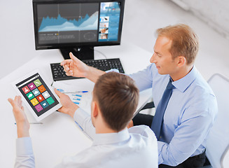 Image showing businessmen tablet pc using applications at office