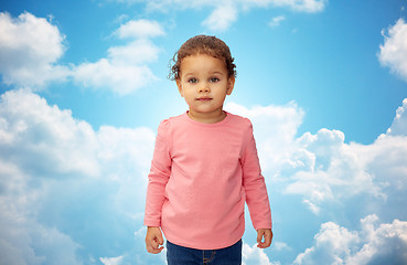 Image showing beautiful little baby girl portrait over blue sky