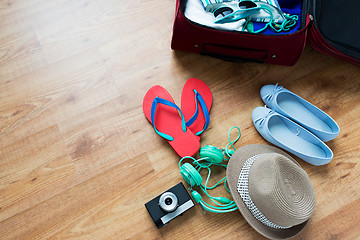 Image showing close up of travel bag with clothes and stuff