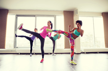 Image showing group of women working out and fighting in gym