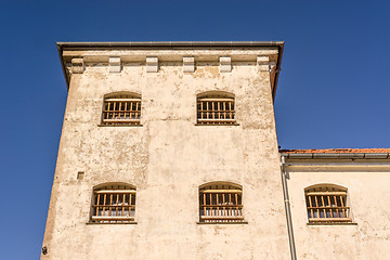 Image showing Prison building with bars on windows