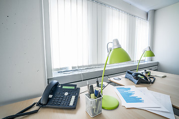 Image showing Telephone and green lamps in a office